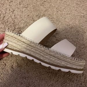 Woman’s wedge sandals. Size 8